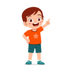 Obraz premium Happy Asian young boy in orange t-shirt and blue shorts pointing up cheerfully smiling