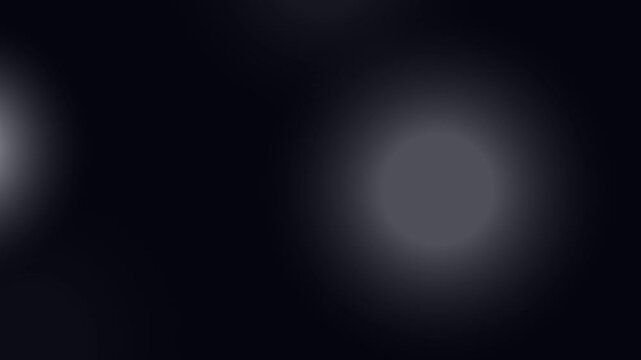Blurry White Spots on Dark Background.