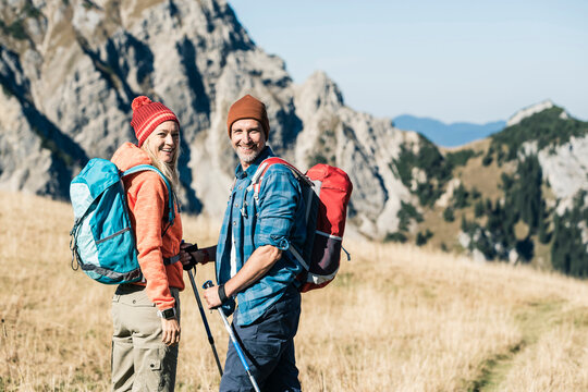Austria, Tyrol, happy couple on a hiking trip in the mountains