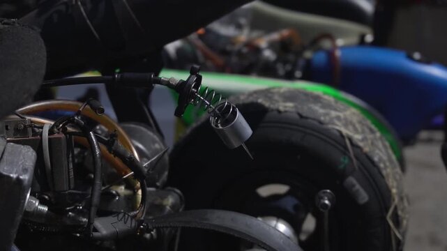 Details of a sports racing car in close-up. Preparing the car for the competition. Pit stop