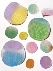Pastel and conte collage illustration featuring polka dots of various sizes in soft pastel tones.