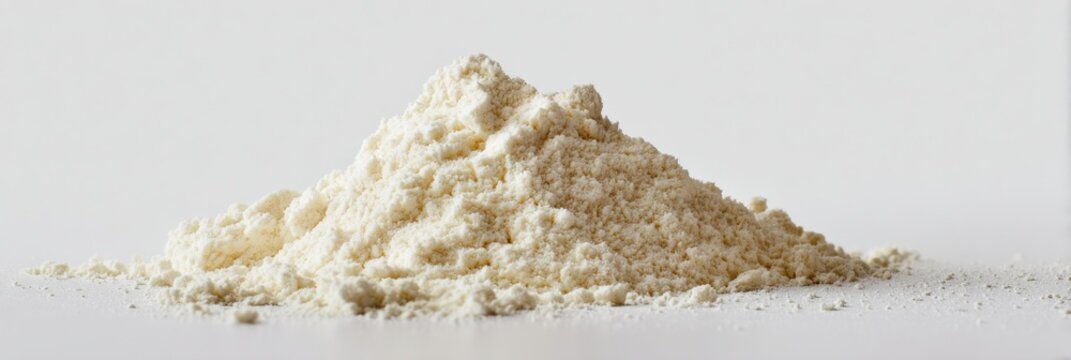 Pile of fine white flour on a neutral background