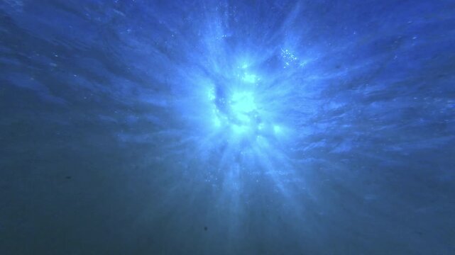 Underwater Sunlight and Beach Waves and Sand