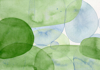 Abstract green and blue watercolor painting with copy space