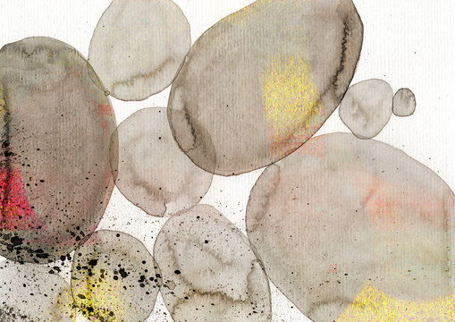 Abstract watercolor painting with golden tones and stone shapes