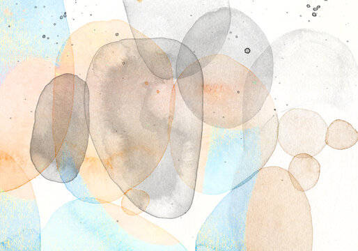 Abstract watercolor painting with round stone shapes and copy space