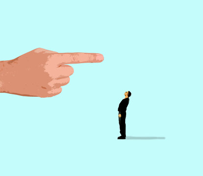 Oversized hand pointing at businessman as metaphor for pressure and direction