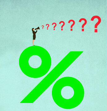 Businesswoman with megaphone standing on percentage sign with question marks