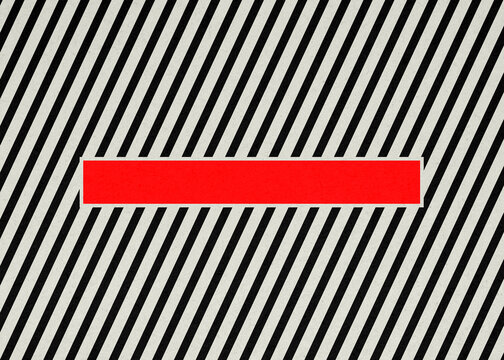Red rectangle on diagonal black and white striped geometric background