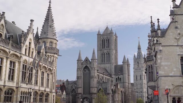 Walking towards Saint Nicholas' Church with Belfry of Ghent Belgium in Background
