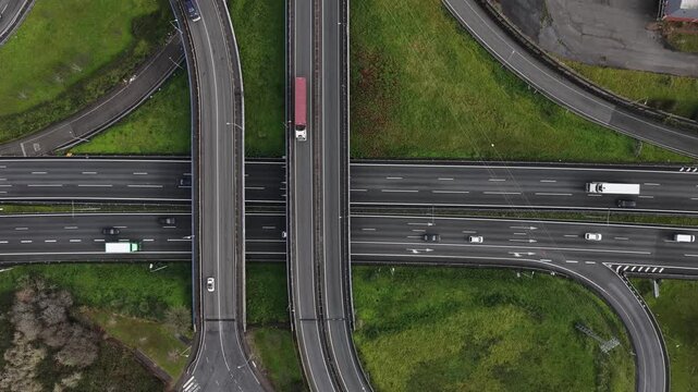 Top down aerial shot of highway exit to industrial zone in Portugal