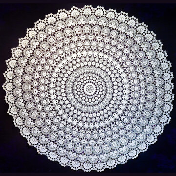 beautiful white lace background. white handmade lace, isolated on black background