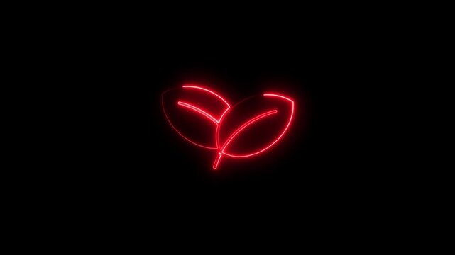 Neon red leaf heart shape glowing on black background eco friendly symbol