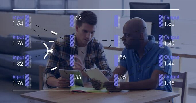 Plaid-shirt man tapping tablet, colleagues comparing business charts at breakout table to wrap plan