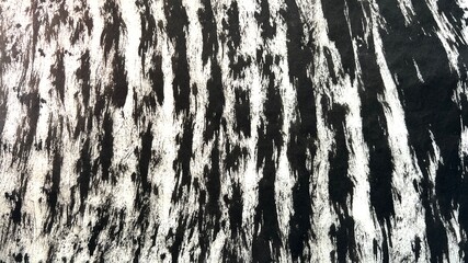 Mottled pattern drawn with ink, lines drawn with brush strokes, faded ink lines, bold brush marks in ink.