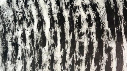 Mottled pattern drawn with ink, lines drawn with brush strokes, faded ink lines, bold brush marks in ink.