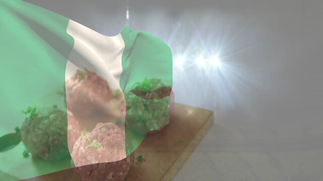 Nigerian flag entering left, waving across frame, showcasing meatballs on wooden board under flares