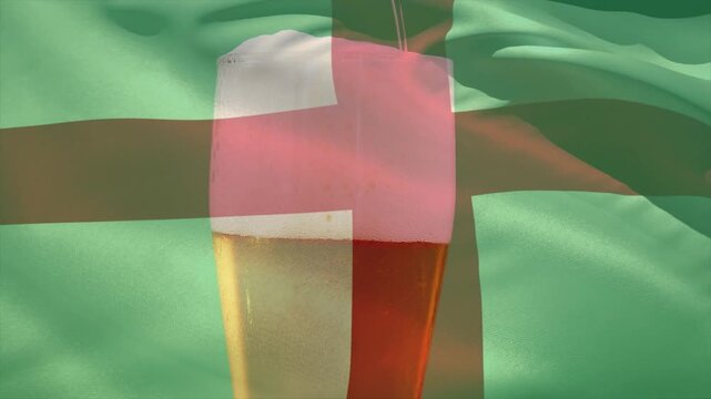 Thin stream starting pour, tall beer glass filling to build foam while flag rippling casting hues