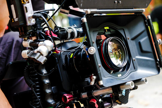 Behind the scenes of a movie. Film crew working in a studio