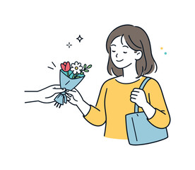 Obraz premium Woman receiving a bouquet of flowers from another person's hands