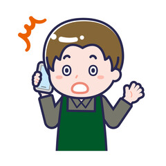 スマートフォンを使う「飲食店の店員」の男性