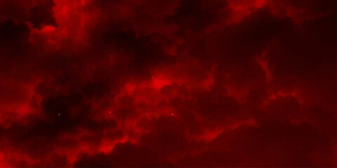 An abstract red fire and smoke background blends with a dramatic dark sunset sky where stormy clouds and black textures create a motion-filled atmosphere across the heavenly space © Sema