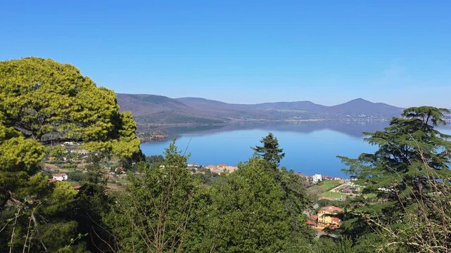 Panoramic Winter View of Lake Bracciano from the Ancient Ramparts of Orsini-Odescalchi Castle under Bright Sunlight, Italy