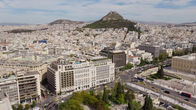 Syntagma square, Mount Lycabettus and Hellenic Parliament in Athens Greece during the day time