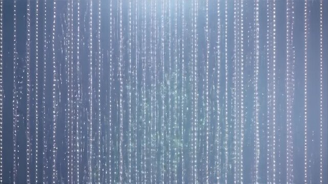 Digital rain effect with binary code falling vertically on a dark background viewed from a straight-on perspective
