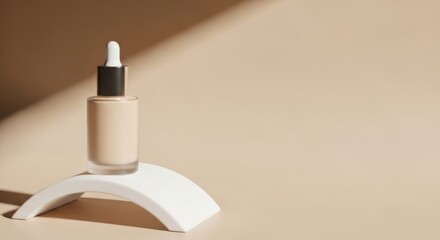 Cosmetic bottle on curved pedestal in soft light