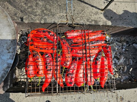 Grilled whole red paprika ramiro pepper