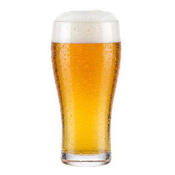 Cold glass of light beer with foam and condensation drops on grey background
