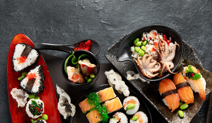 Various types of sushi including nigiri and rolls. Asian food concept. © bit24
