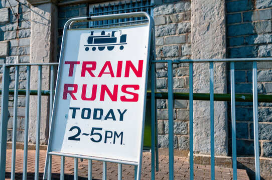 Sign advising visitors that a steam train will run today 2-5pm