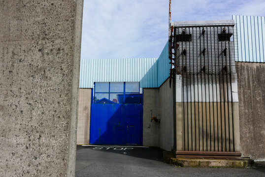 Vehicular entrance and watchtower at a former high security prison for paramilitaries.