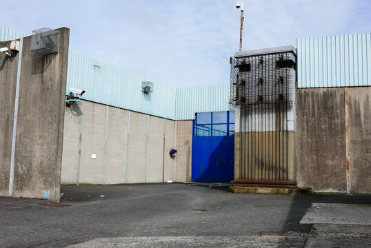 Vehicular entrance and watchtower at a former high security prison for paramilitaries.