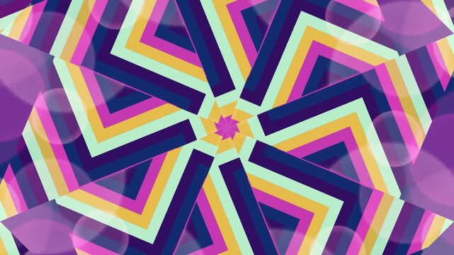 Vibrant geometric pattern with pink, purple, and yellow shapes forming a flower-like design on a dark background ino (5)