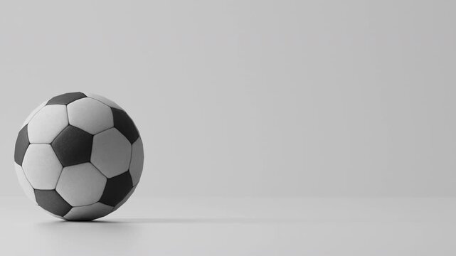 Soccer ball bounces on white background