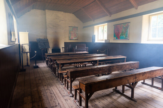 Smoke from a fire fills the air inside an old Irish schoolhouse.