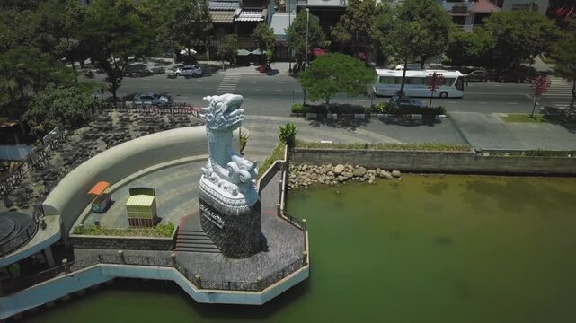 Aerial view of the ca chep hoa rong dragon statue overlooking the han river in da nang, vietnam