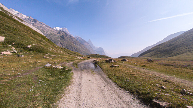 The Tour du Mont Blanc crosses France, Italy, and Switzerland, offering breathtaking views of glaciers, alpine passes, and the highest peak in the Alps.