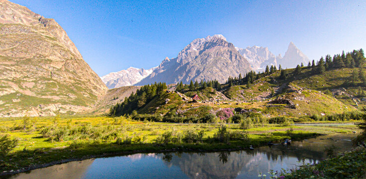 The Tour du Mont Blanc crosses France, Italy, and Switzerland, offering breathtaking views of glaciers, alpine passes, and the highest peak in the Alps.