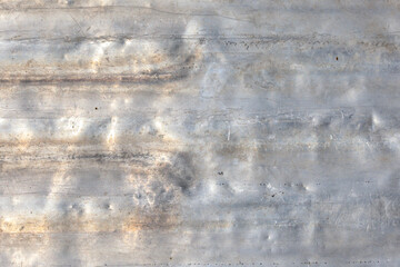 Obraz premium Grungy aluminum surface showcases texture with visible scratches and dents.