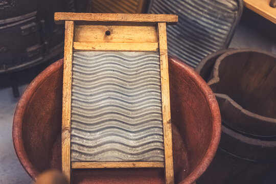 Vintage washboard and basin found in a local antique shop during a weekend visit for treasure hunting