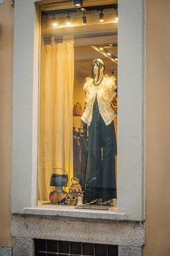 Milan, Italy - 2026, 17 Feb: Striking DAAD SS26 boutique window with ruffled jacket, bold accessories, and elegant styling, capturing Milan&rsquo;s high fashion essence
