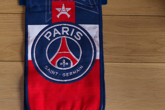Paris Saint‑Germain F.C. logo on a scarf, representing a leading French football club from Paris, France.