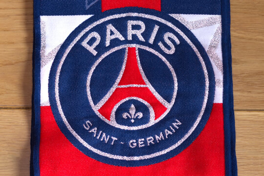 Paris Saint‑Germain F.C. logo on a scarf, representing a leading French football club from Paris, France.