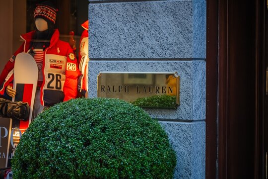 Milan, Italy - 2026, 17 Feb: Ralph Lauren storefront featuring Milano Cortina Olympic Games winter sportswear in a stylish, upscale city setting