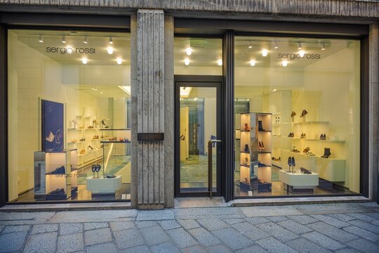 Milan, Italy - 2026, 17 Feb: Sergio Rossi SS26 boutique window displays luxury footwear in a chic, modern setting, highlighting Italian style and contemporary elegance