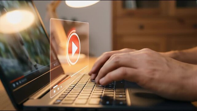 Close-up of hands typing on a laptop with a translucent video player interface and play button overlay glowing above the keyboard, warm cinematic lighting with shallow depth of field and gentle push-i